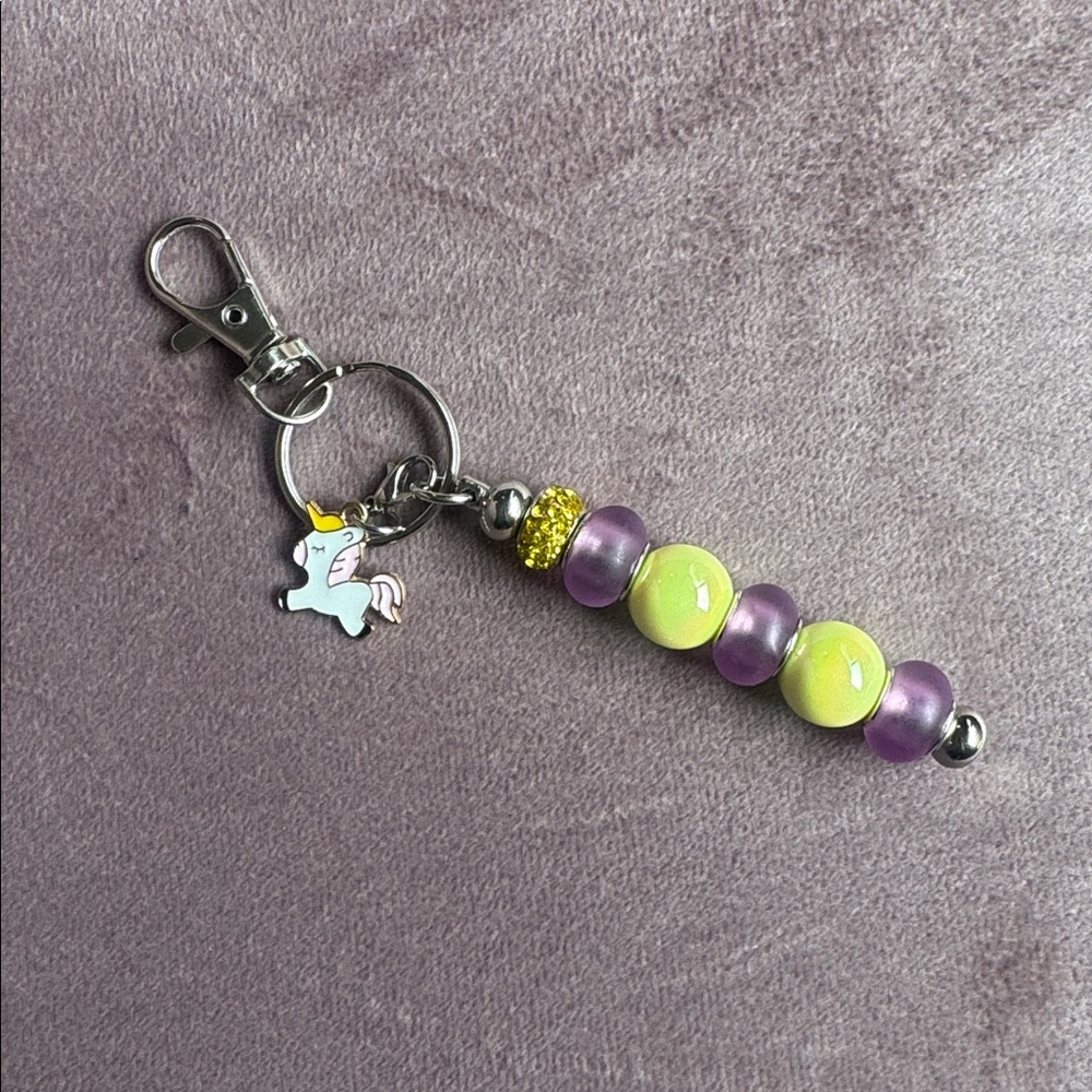 Addie’s Bagcharm Keychains Yellow And Purple with Unicorn charm
